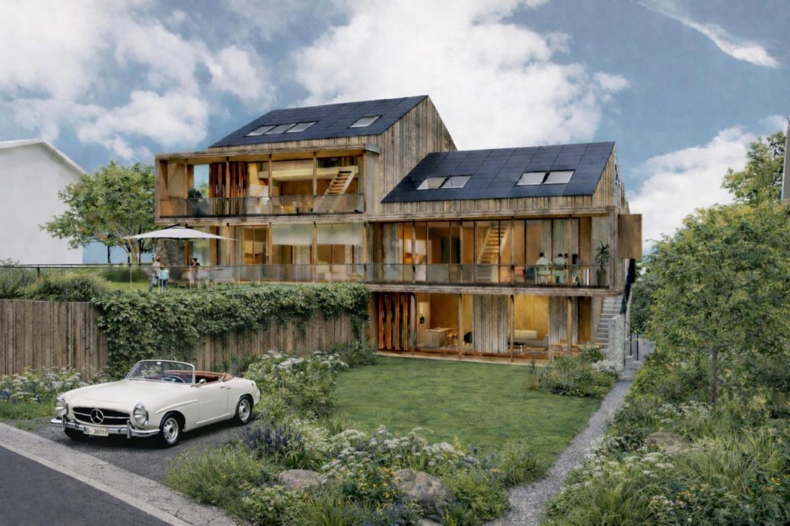 Moderne Küche mit Holzdecke und Blick auf schneebedeckte Landschaft und See.